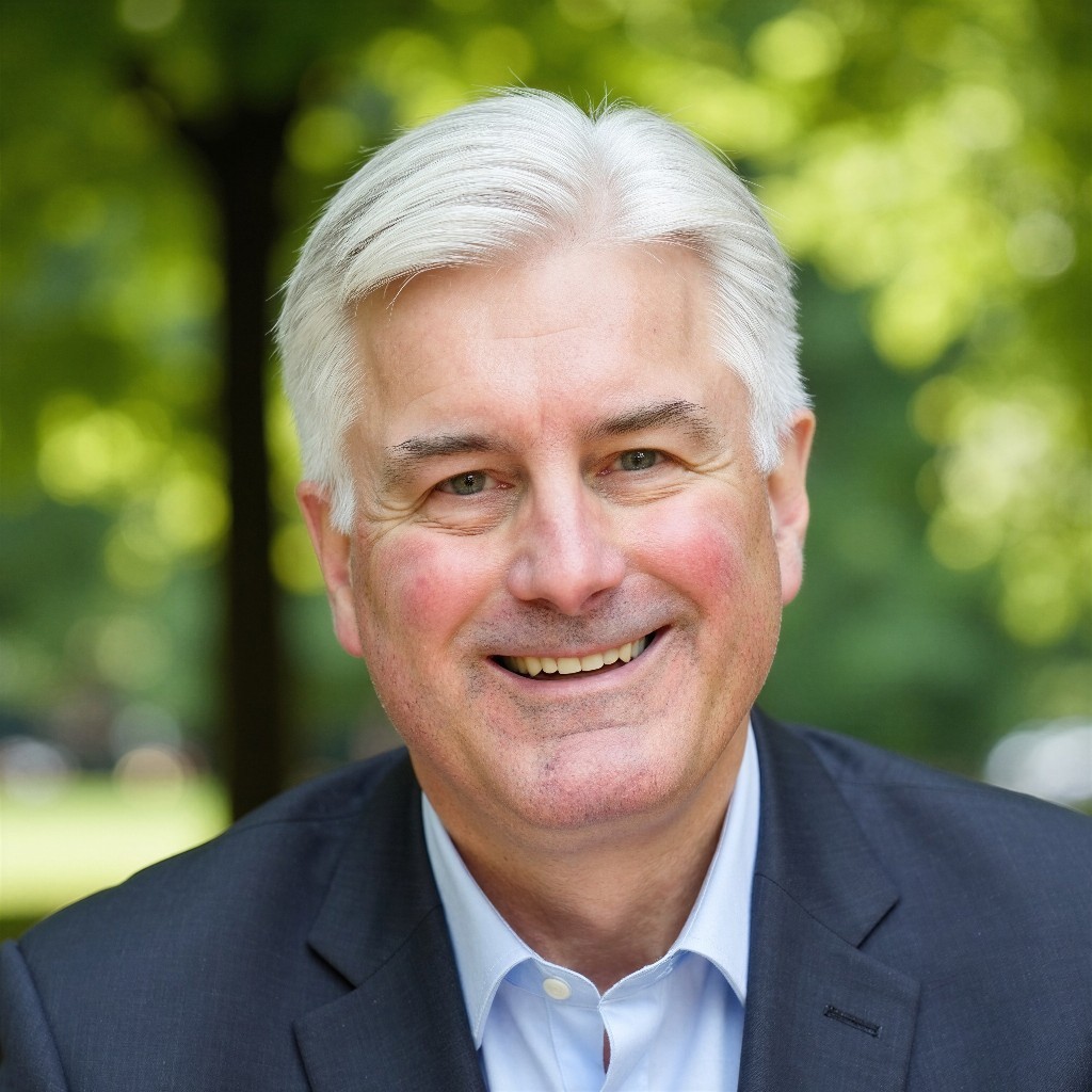 Headshot of Matthew H. Burnell smiling outdoors.